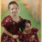 Matching sister outfits for babies and girls in burgundy floral 