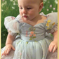 The perfect baby girl dress in light blue floral with a floral embroidery design. With a built in bodysuit to complete the dress. 