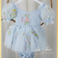 Baby girl dress in a light blue floral tulle. Perfect for a baby first birthday dress. 
