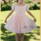 Girls special occasion dress in a light pink tulle