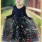 Navy blue floral girls dress with embroidered flowers and greenery on the tulle. Made in a long sleeve lace top in navy with a floral navy full length skirt .
